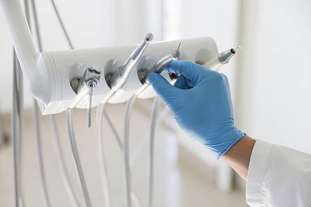 Professional Tooth Extraction technician working in Forest Meadows, CA